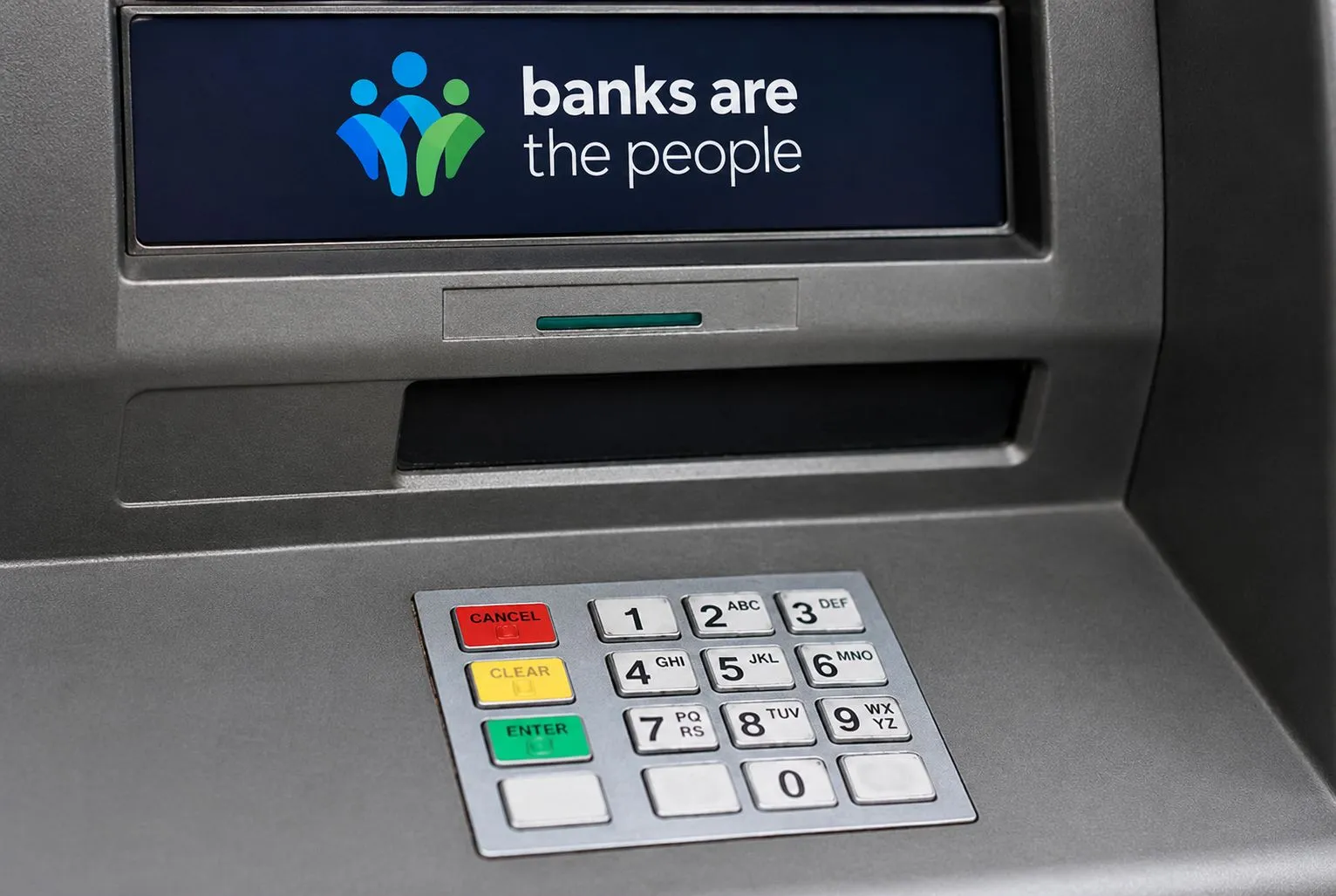 ATM keypad on a cash machine, with red Cancel, yellow Clear and green Enter keys to the left of the number keys